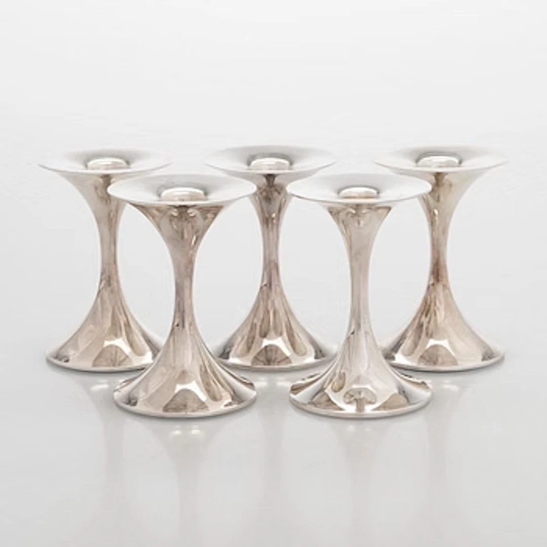 Tapio Wirkkala, A set of five silver 'Trumpet' candlesticks, Kultakeskus
