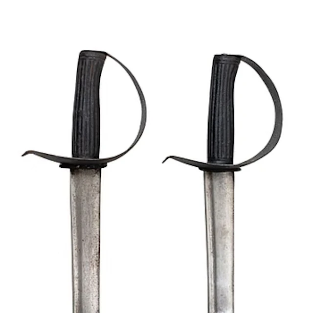 Two 19th century naval cutlasses.