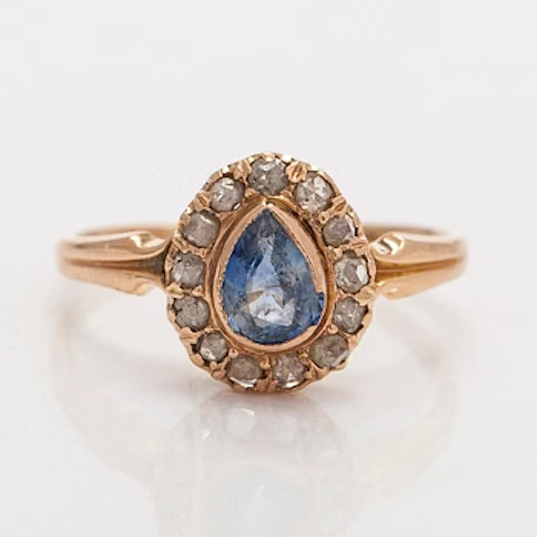 Ring, pear-shaped sapphire, rose-cut diamonds, 14K (56) gold.
