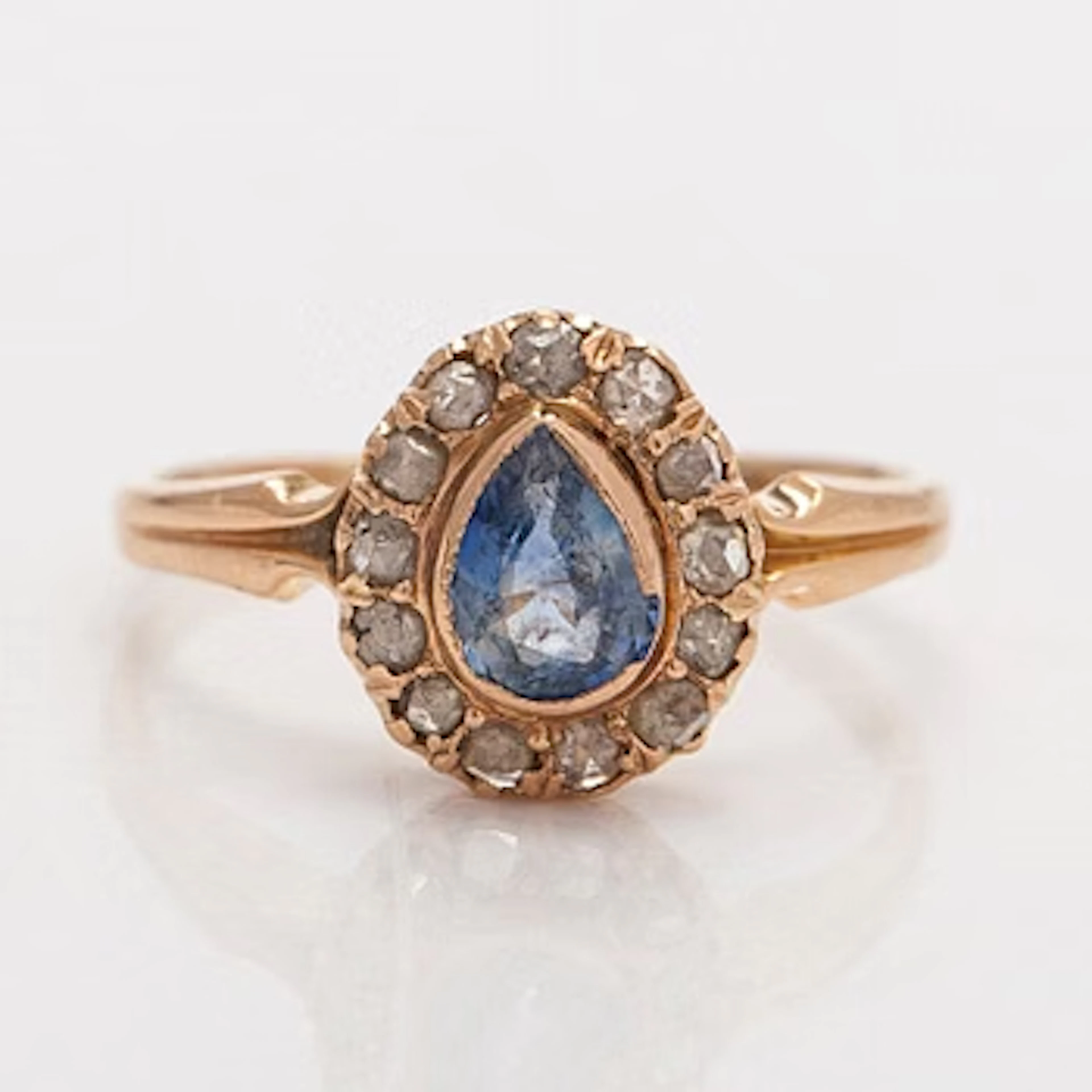 Ring, pear-shaped sapphire, rose-cut diamonds, 14K (56) gold.
