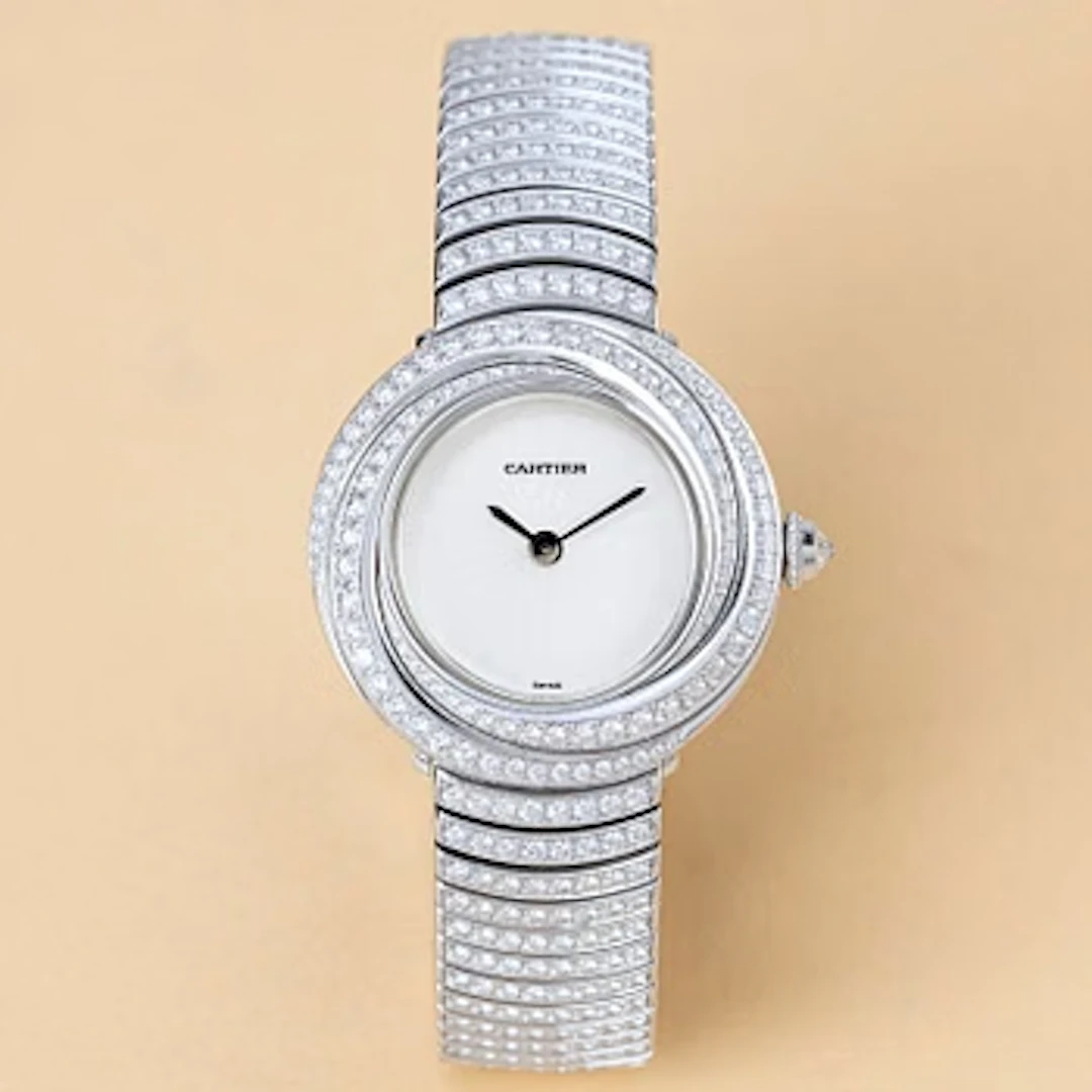 Cartier, Trinity, "Diamond set case and bracelet", ca 2000.