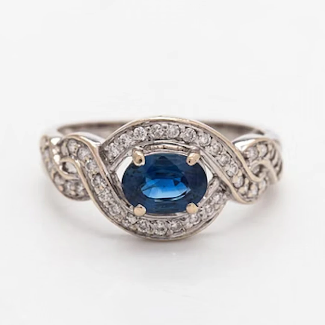 Ring, faceted sapphire, brilliant-cut diamonds, 18K white gold.
