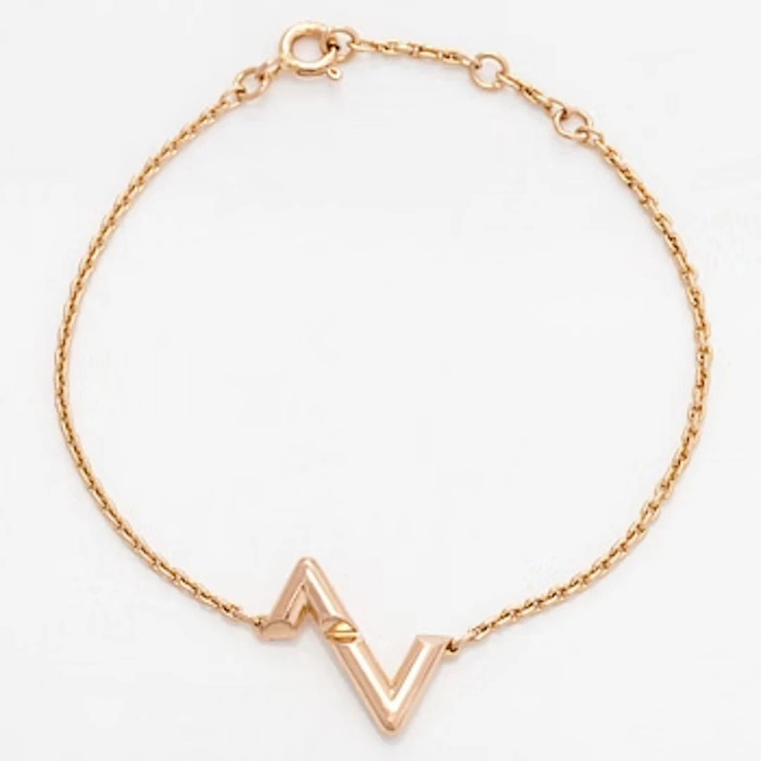 Louis Vuitton, an 18K gold "LV Volt" bracelet.