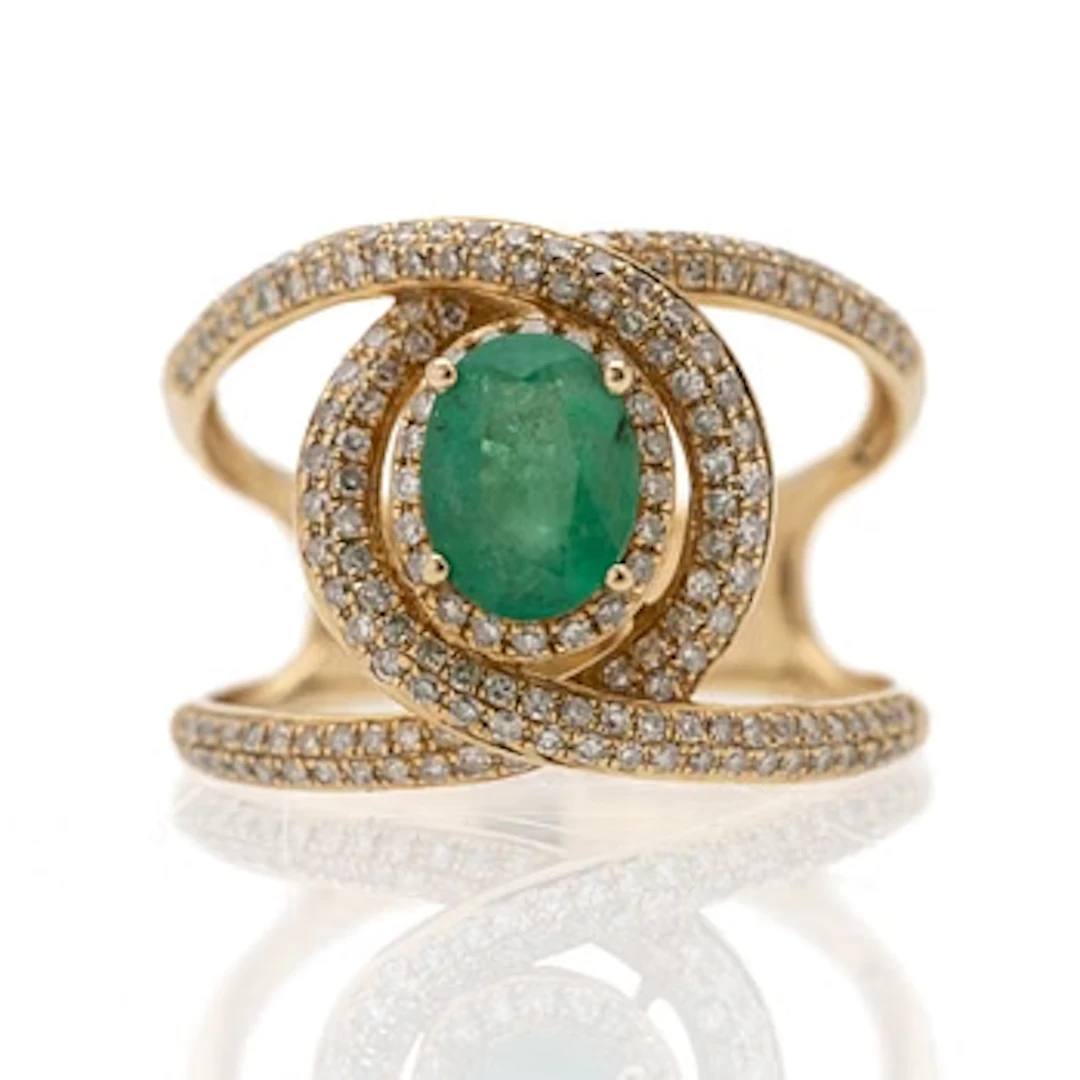 14K gold ring with an emerald and diamonds.