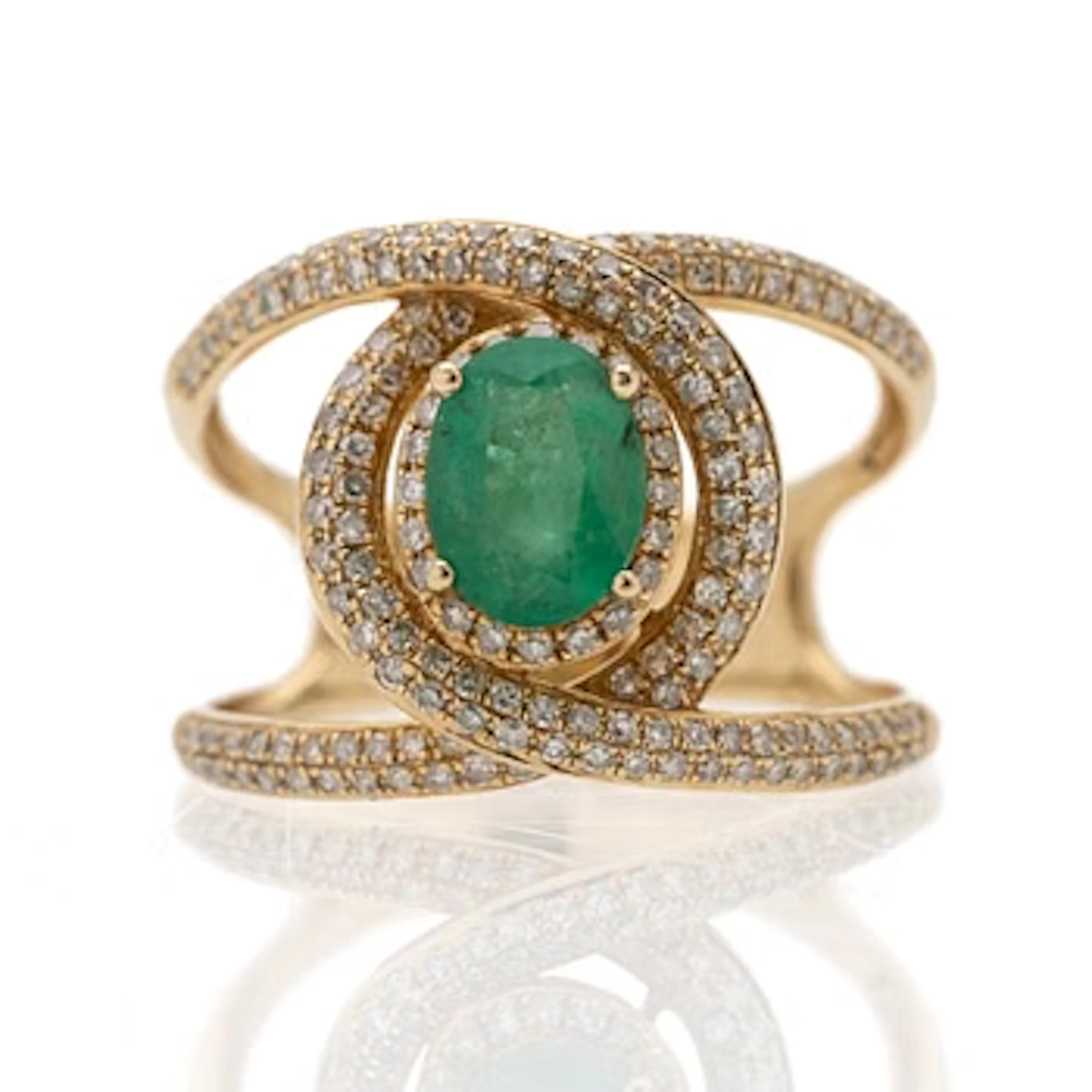 14K gold ring with an emerald and diamonds.