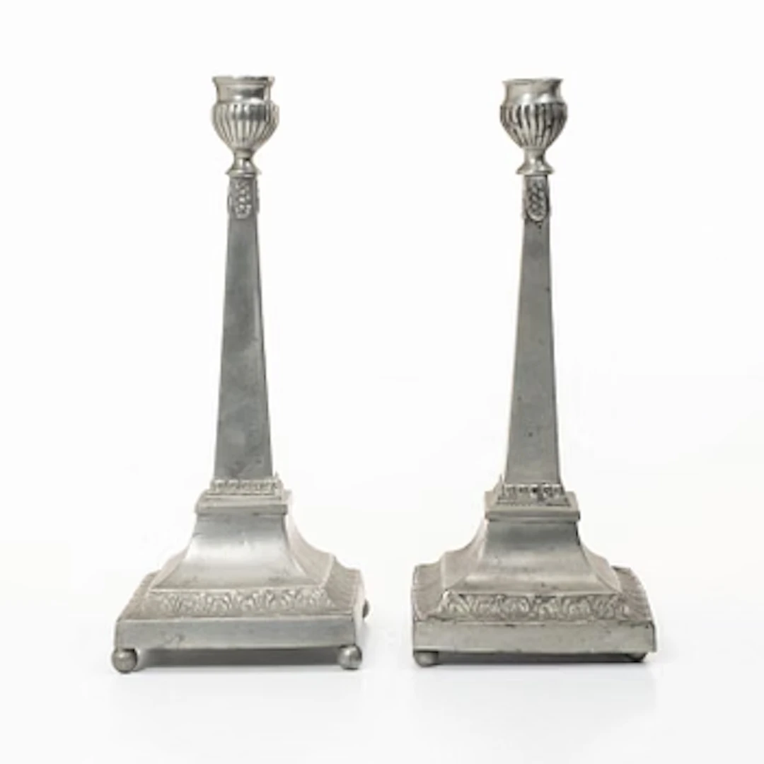 A pair of peuter candlesticks by Petter Höijer, Örebro (1796-1819).