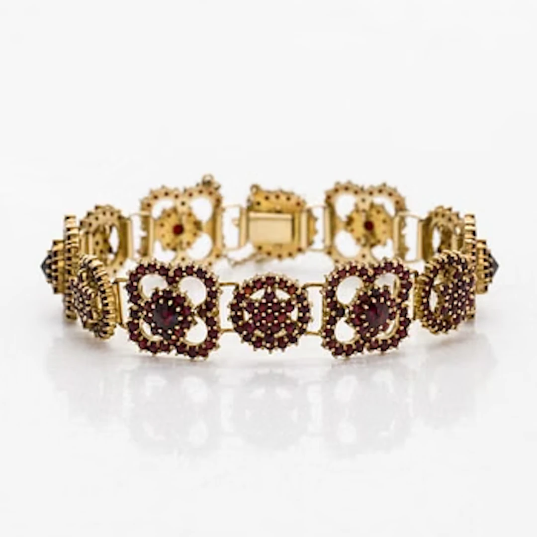 Bracelet, faceted garnets, gilt silver.