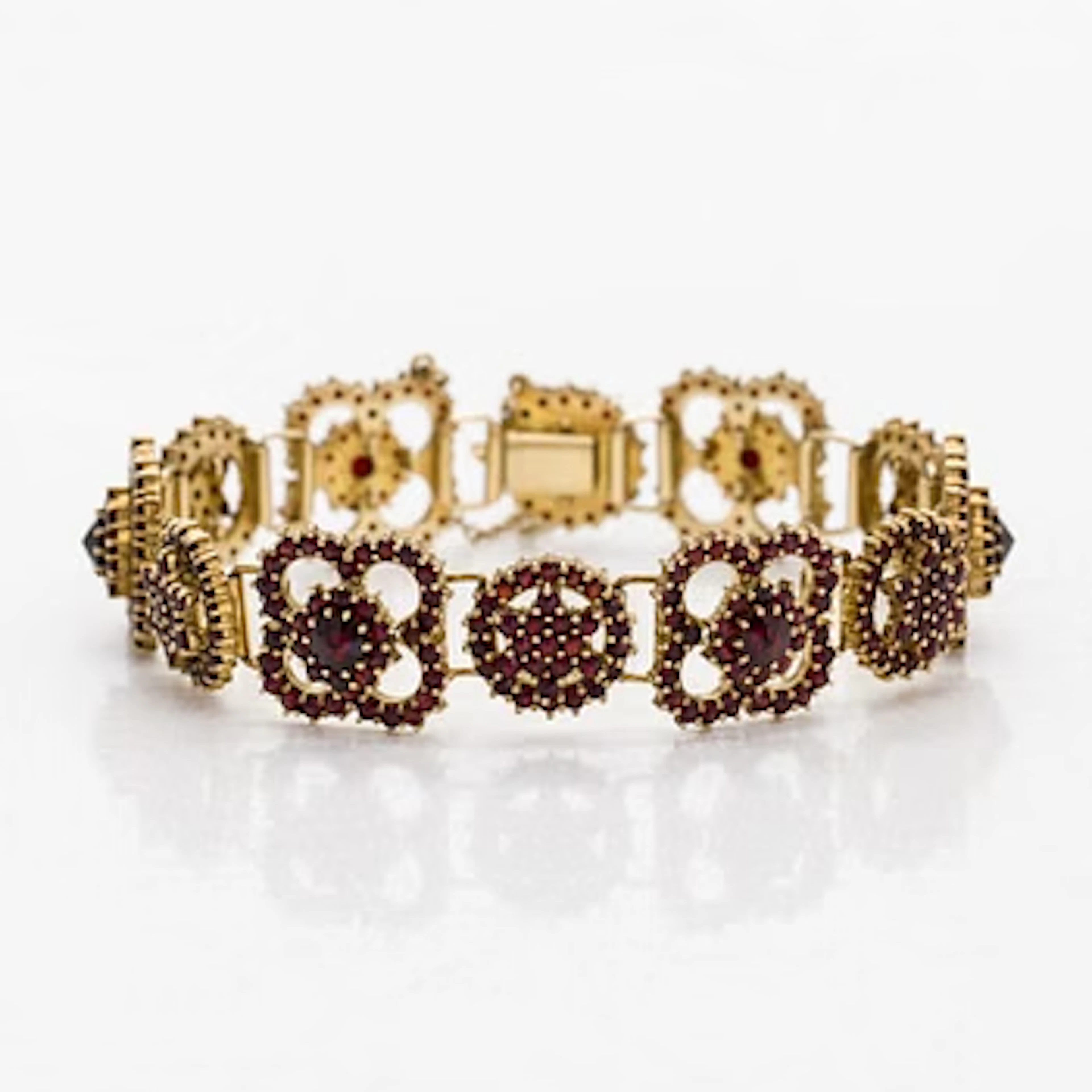 Bracelet, faceted garnets, gilt silver.