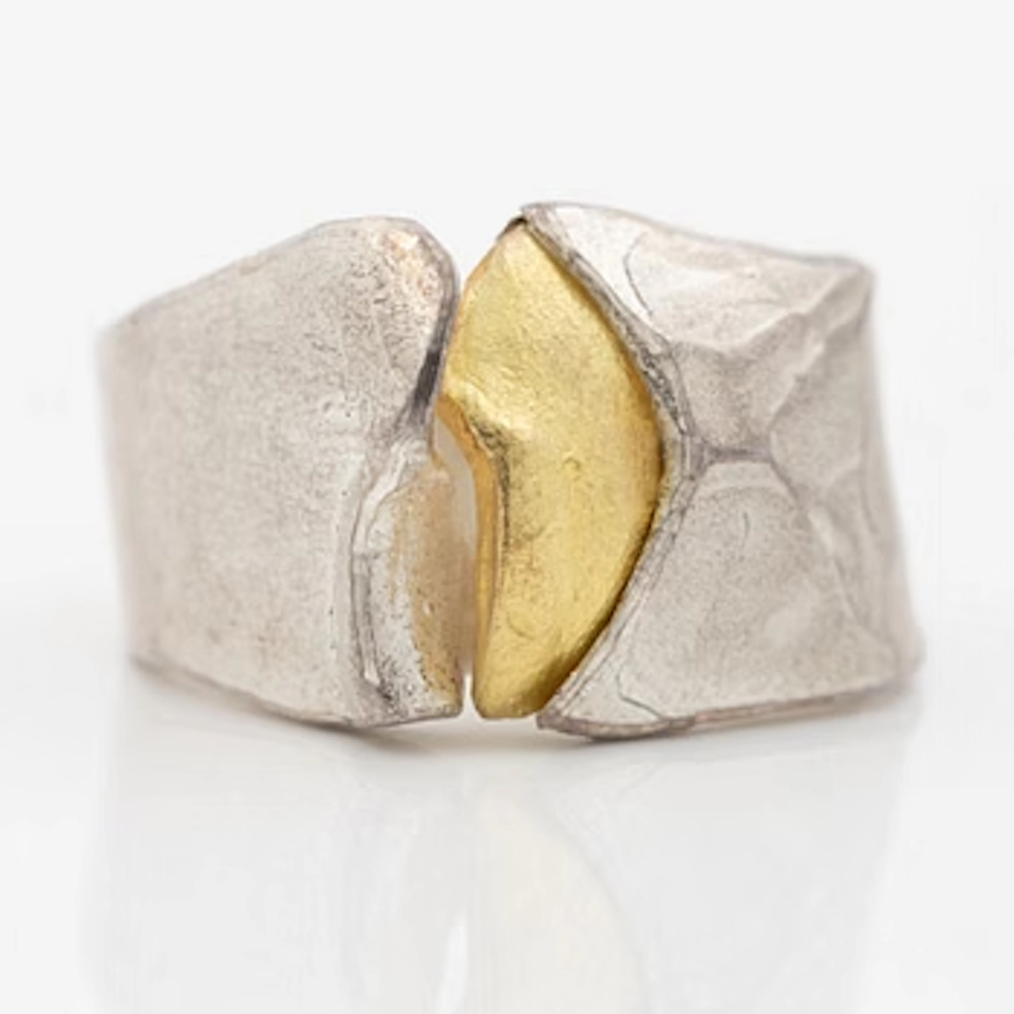 Ring in silver and gilded silver.
