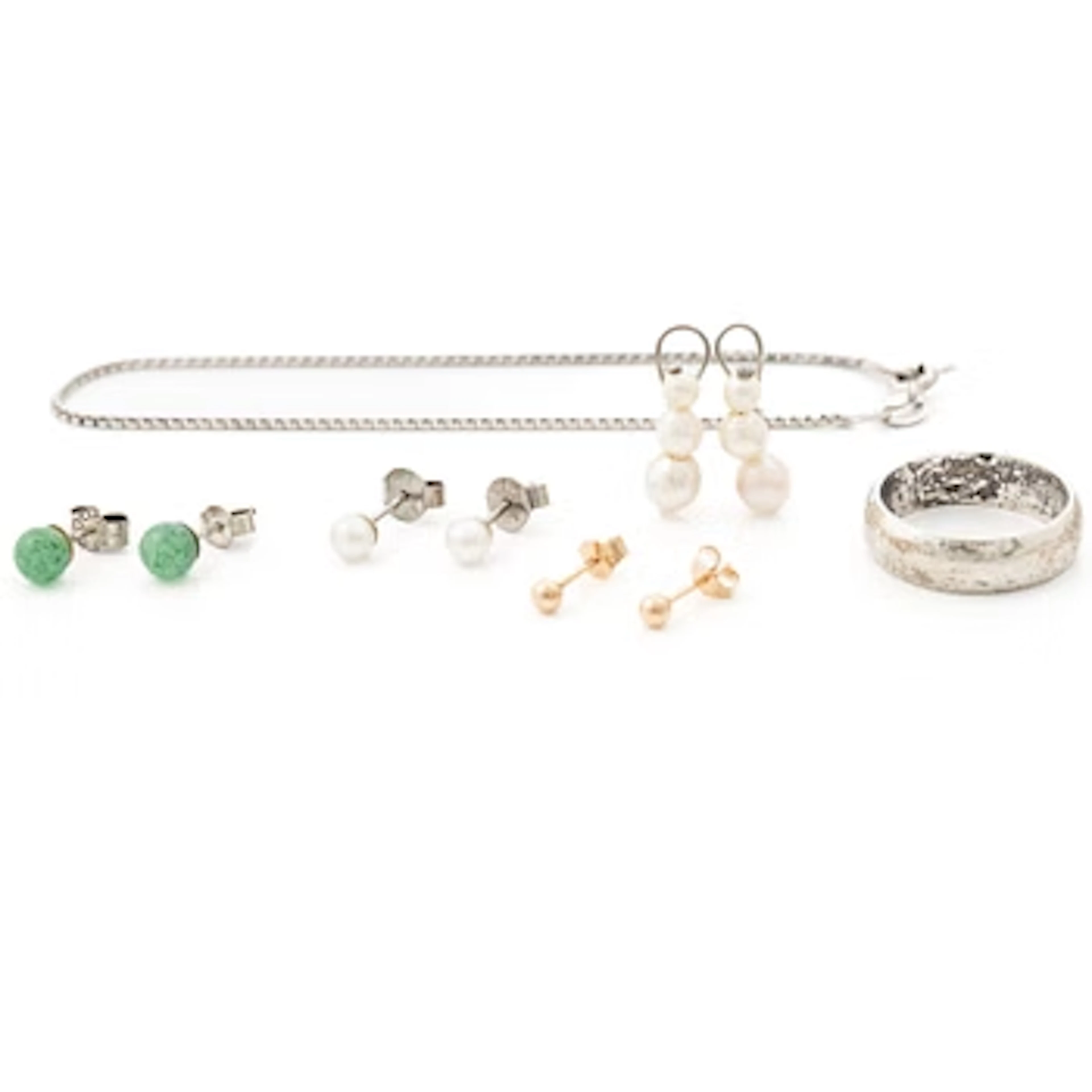 Four pairs of earrings, a silver ring and a silver bracelet chain.
