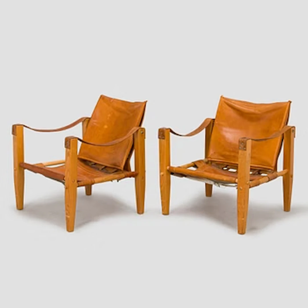 A pair of 'Safari' armchairs for retailer Artek, latter half of the