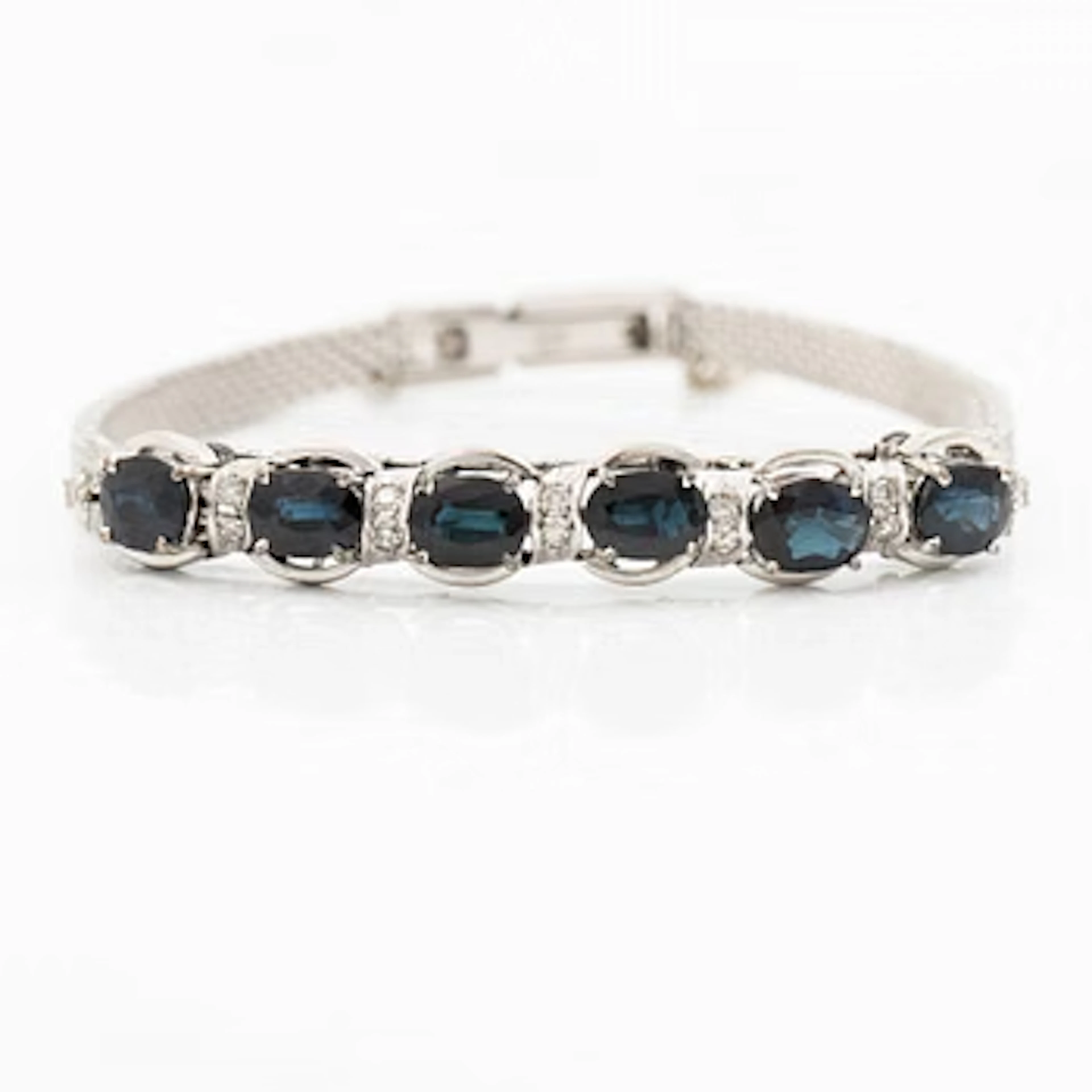 14K white gold bracelet with sapphires and octagon-cut diamonds.