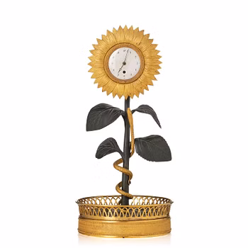 A French Empire ormolu and patinated bronze mantel clock, first part