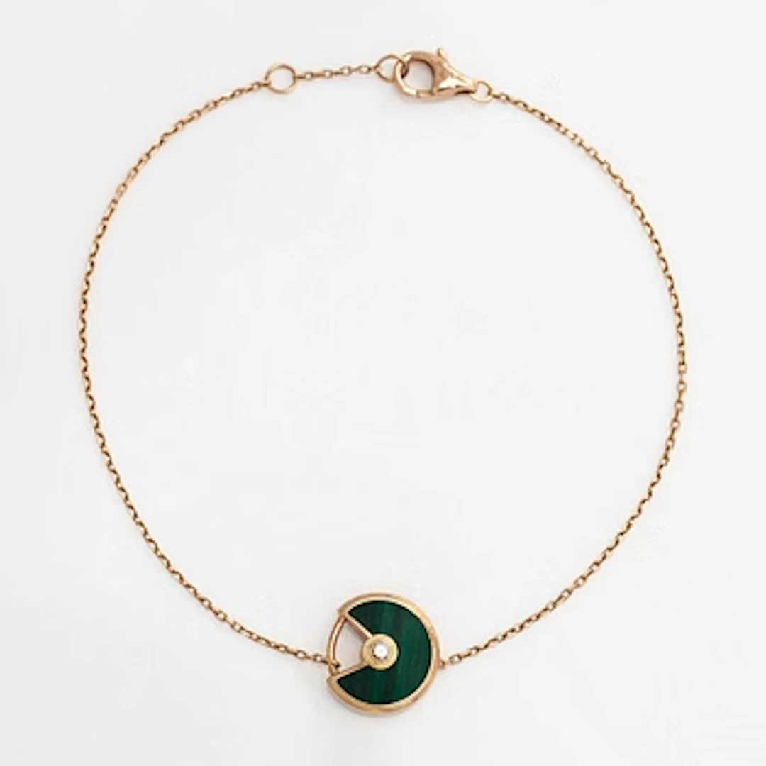 Cartier, an 18K gold "Amulette de Cartier" bracelet with malachite