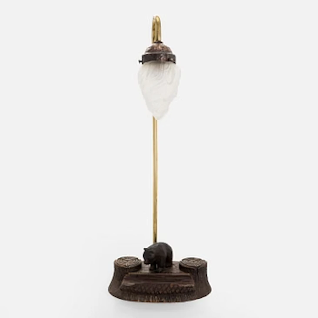 An early 20th century table lamp / writing table.