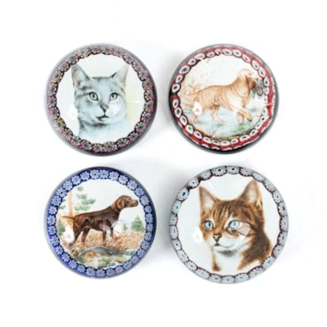A set of four glass paperweights Baccarat, France, 20th century with