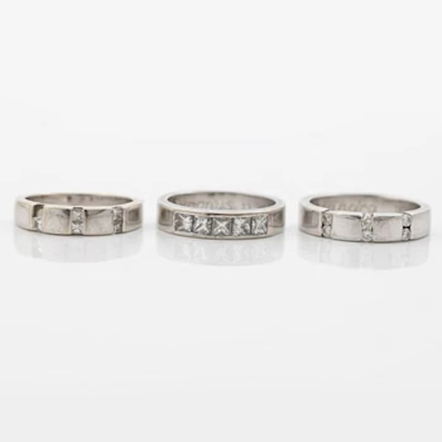 Three rings, 18K white gold with brilliant-cut and princess-cut diamonds.