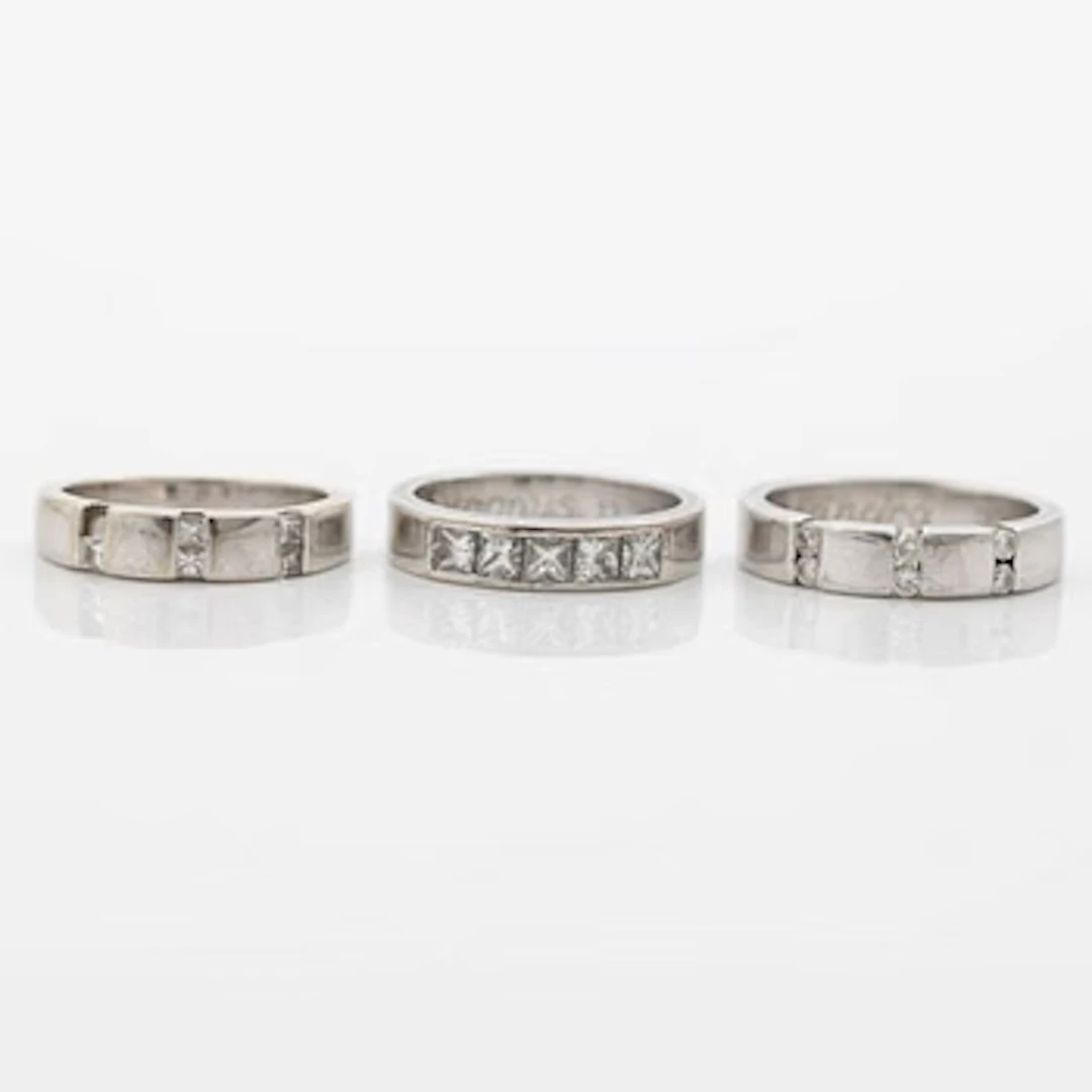 Three rings, 18K white gold with brilliant-cut and princess-cut diamonds.