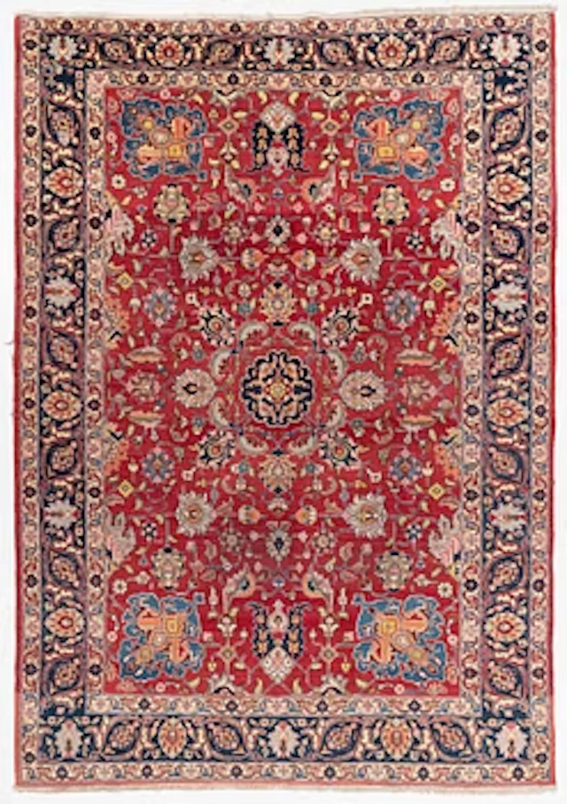 A semi-antique Tabriz carpet, c 358 x 248 cm.