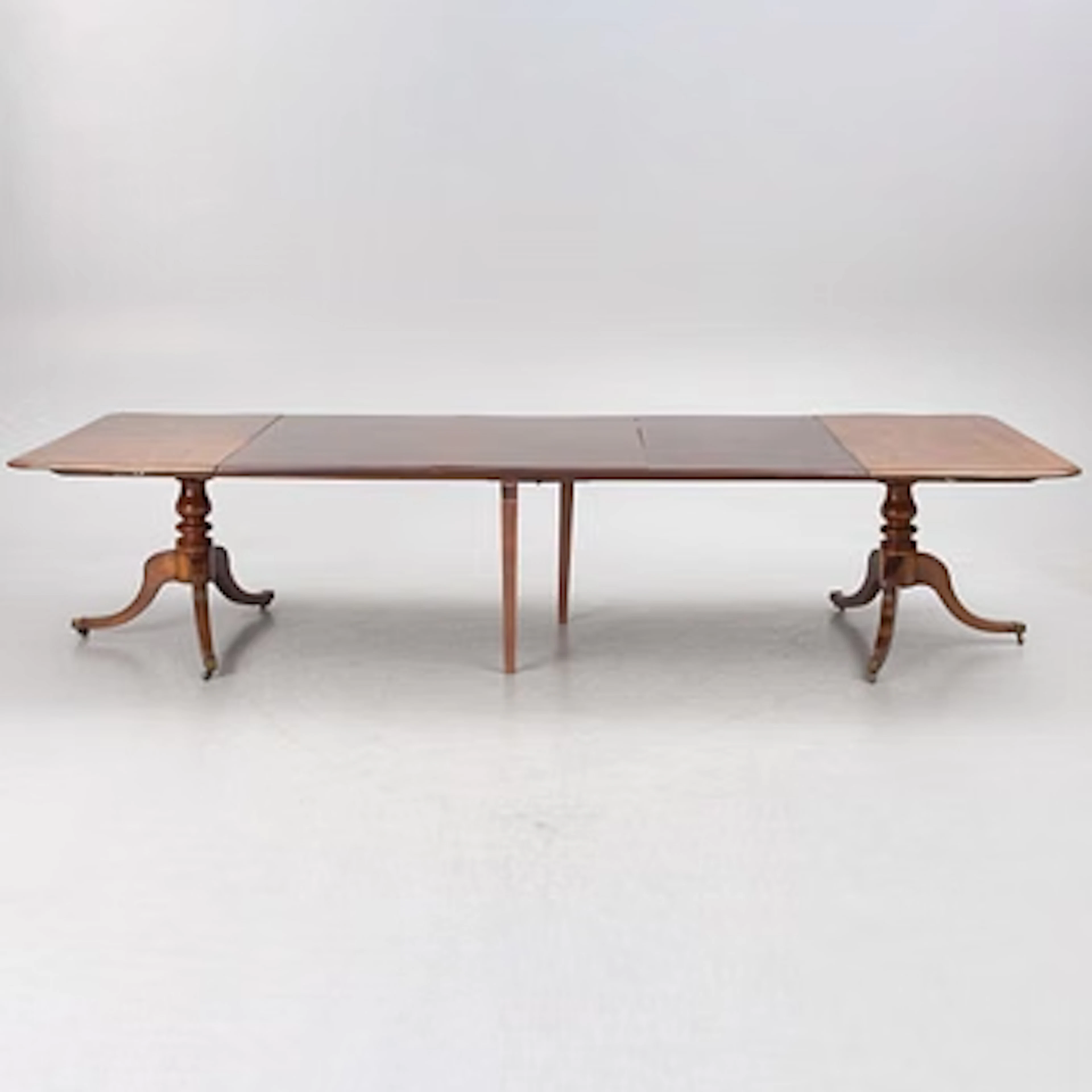 Dining table, England, circa 1900.