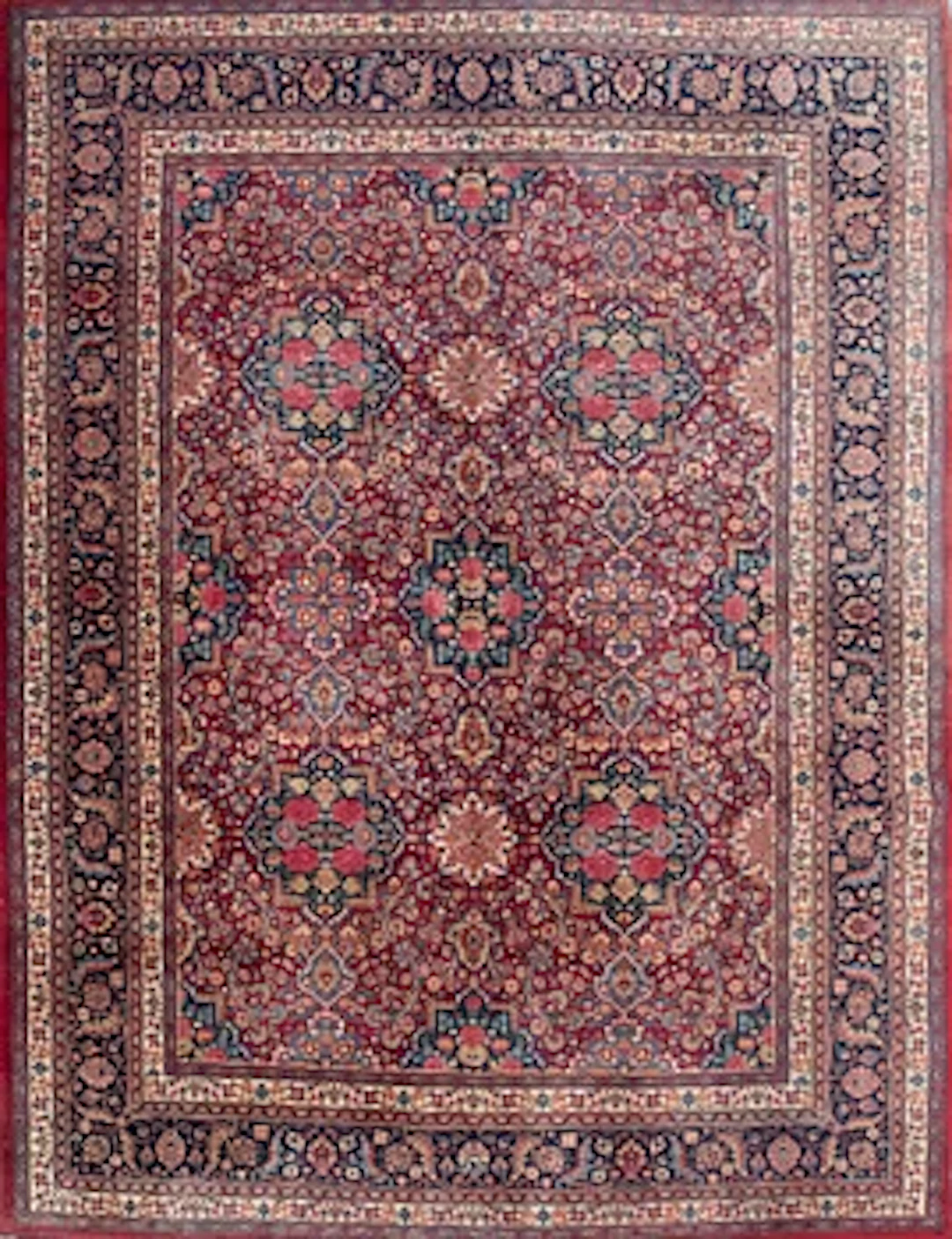 A semi-antique Mashad carpet, East Persia, signed Gahzi Khan, c. 410 x 310 cm.