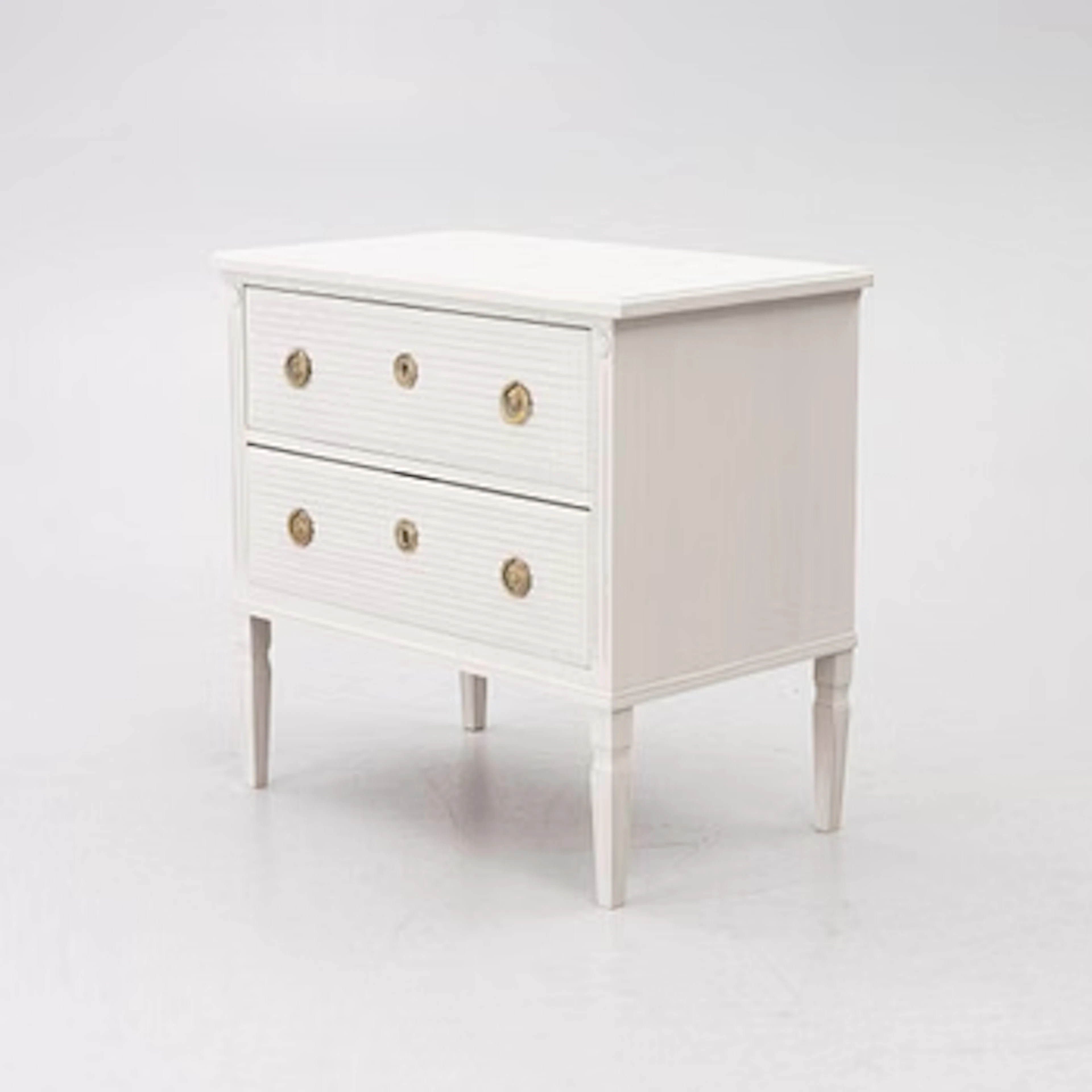 A Gustavian style chest of drawers, second half of the 20th century.