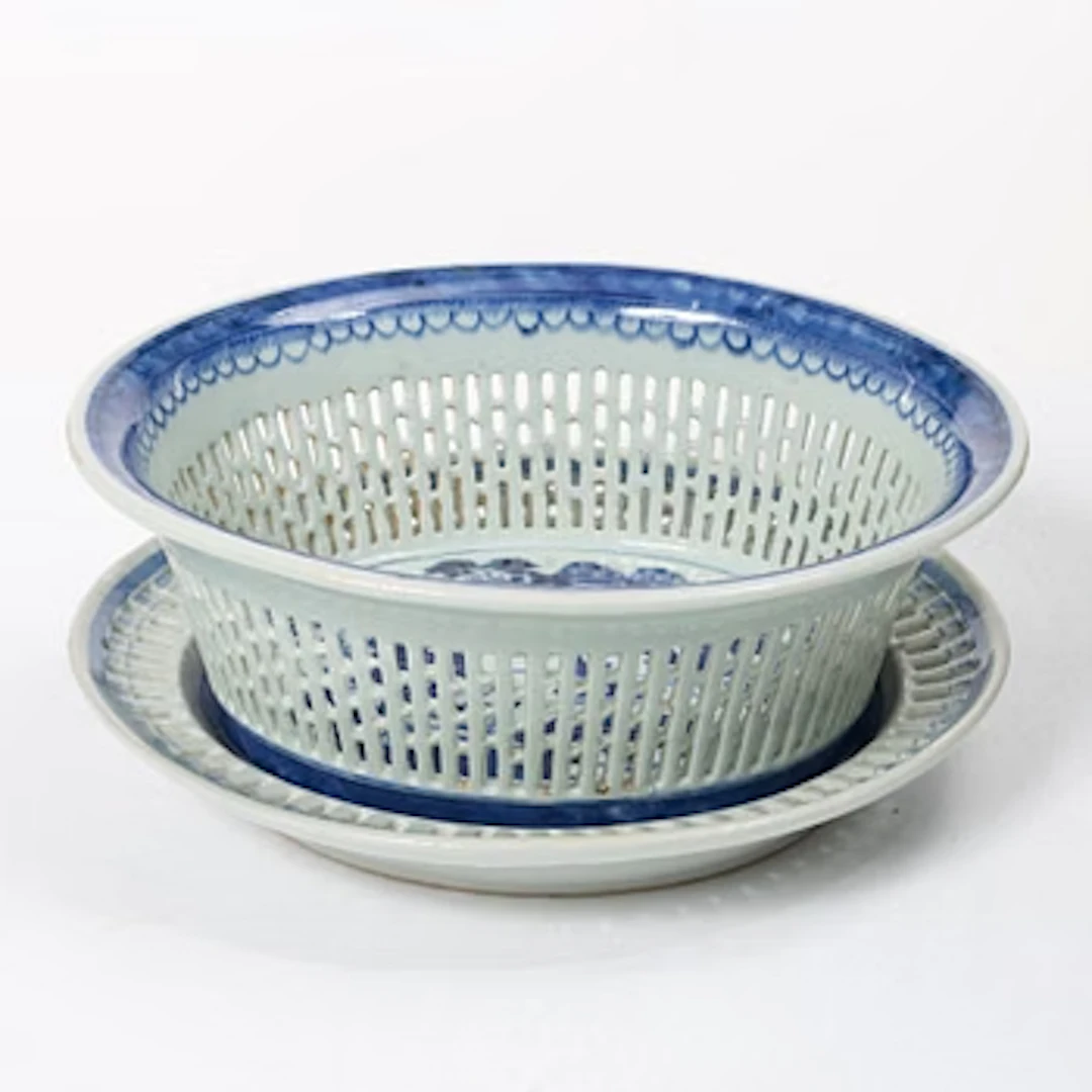 A Chinese blue and white chestnut basket with stand, Qing dynasty