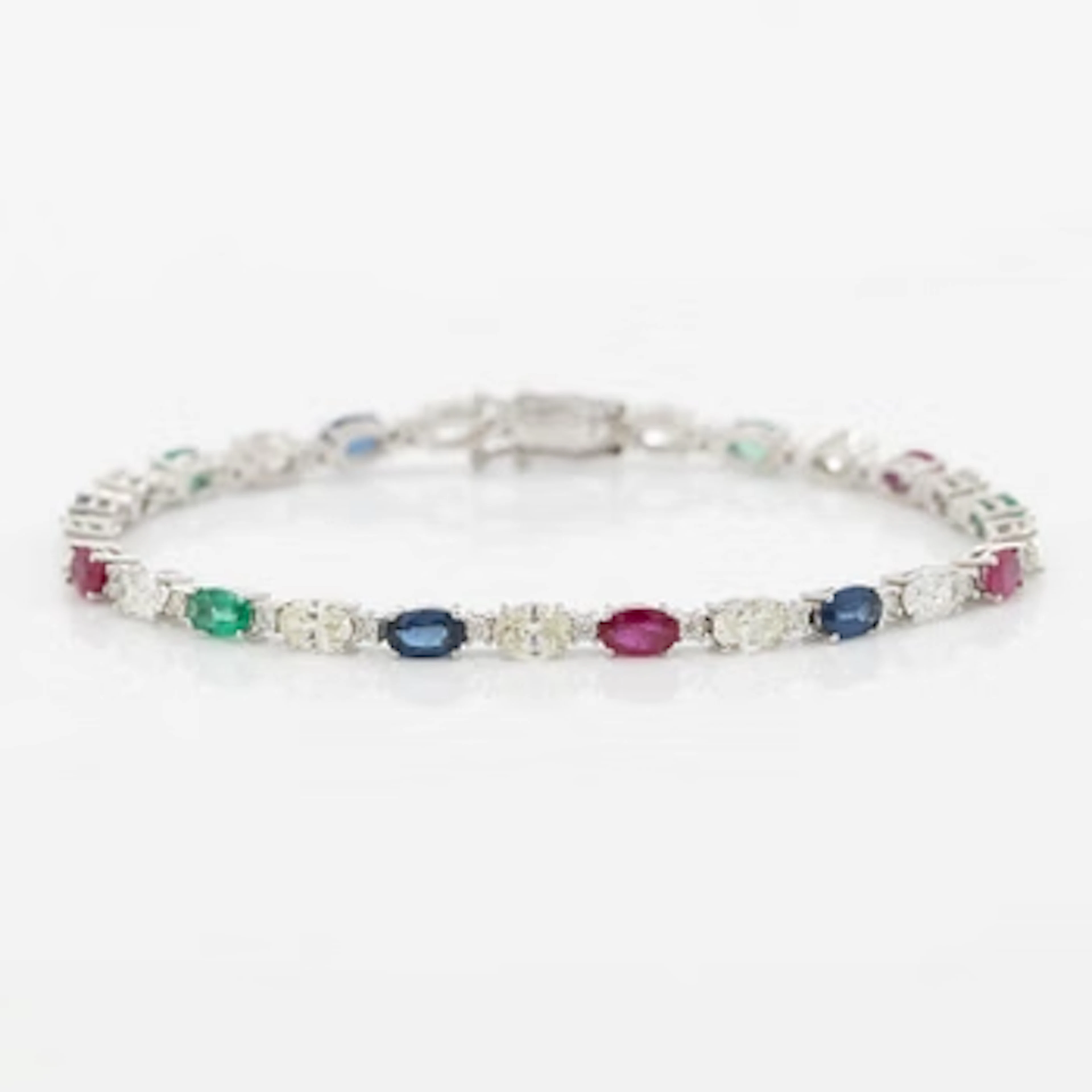 Bracelet 18K white gold set with faceted rubies, emeralds, sapphires