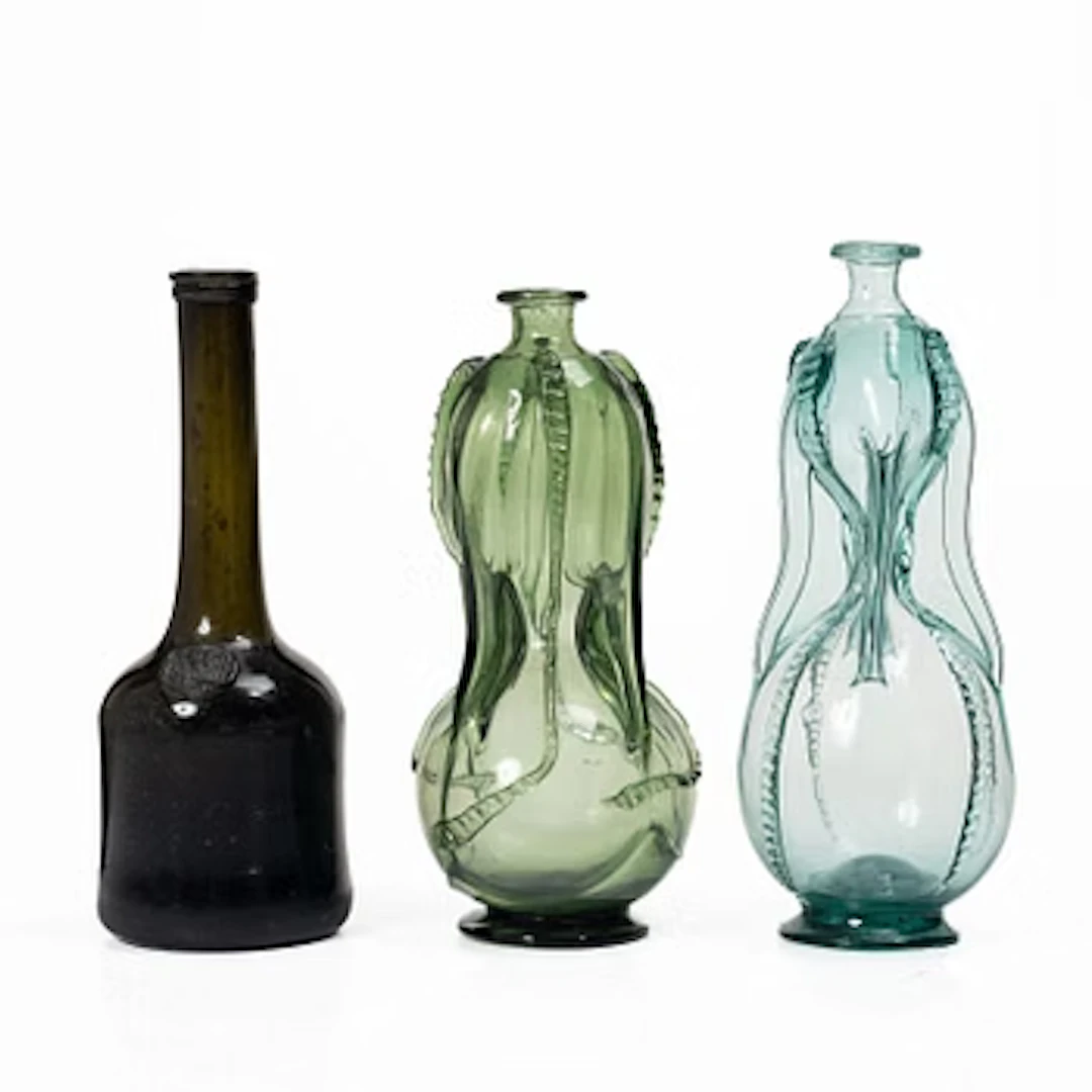 Two Swedsh glass bottles and a bottle from Constantia Wyn, South Africa