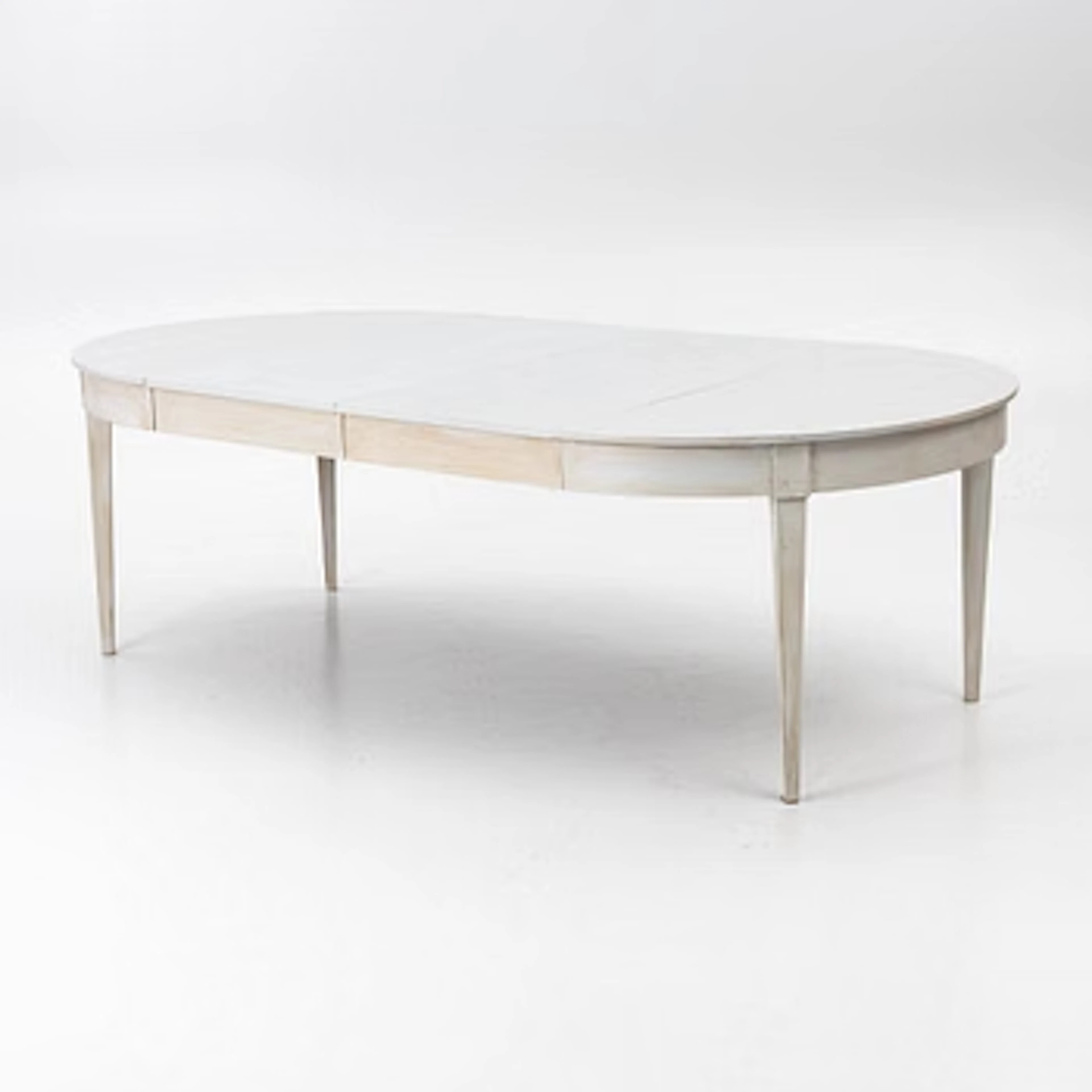A dining table, early 20th Century.