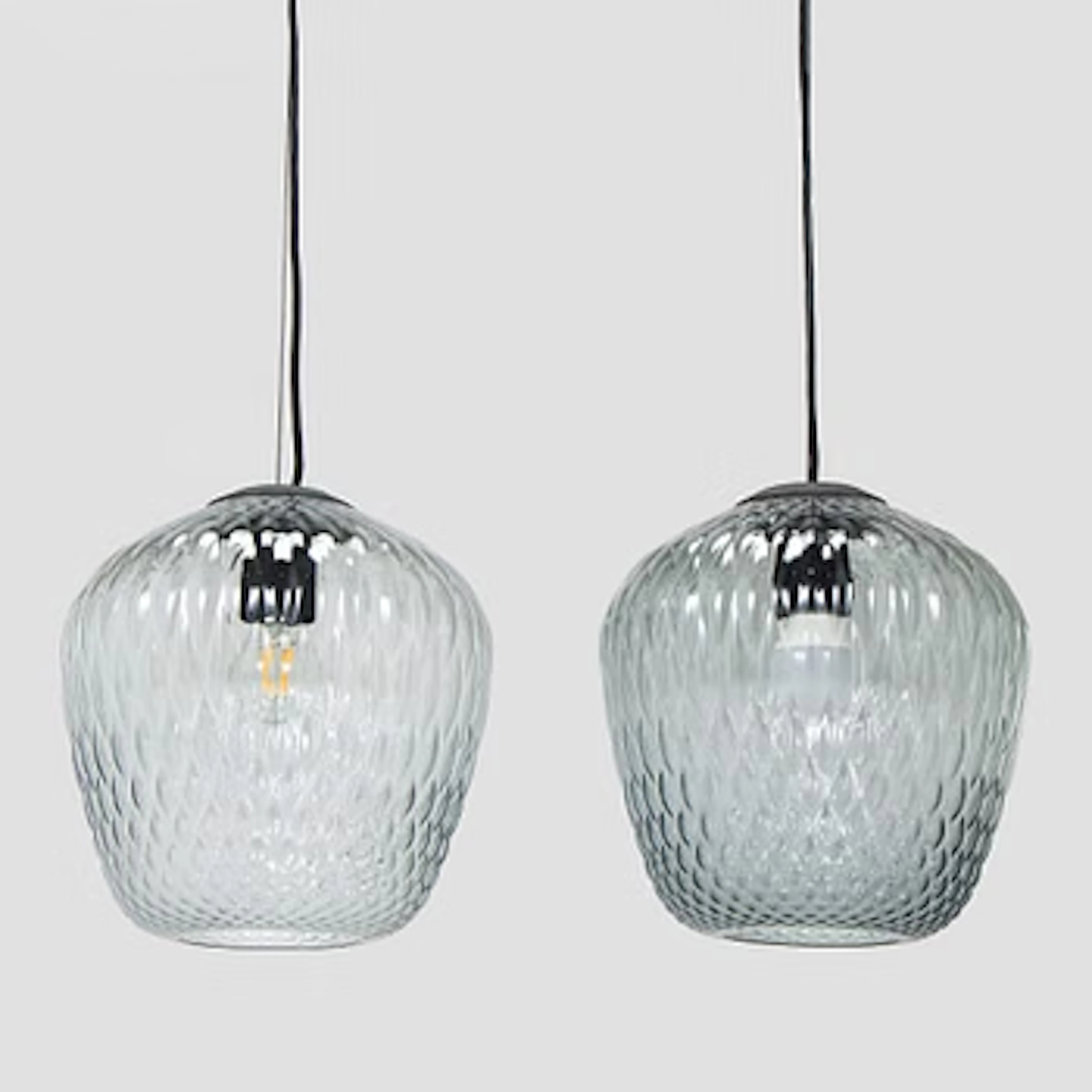 Samuel Wilkinson, a pair of “Blown” pendant lights, &Tradition.