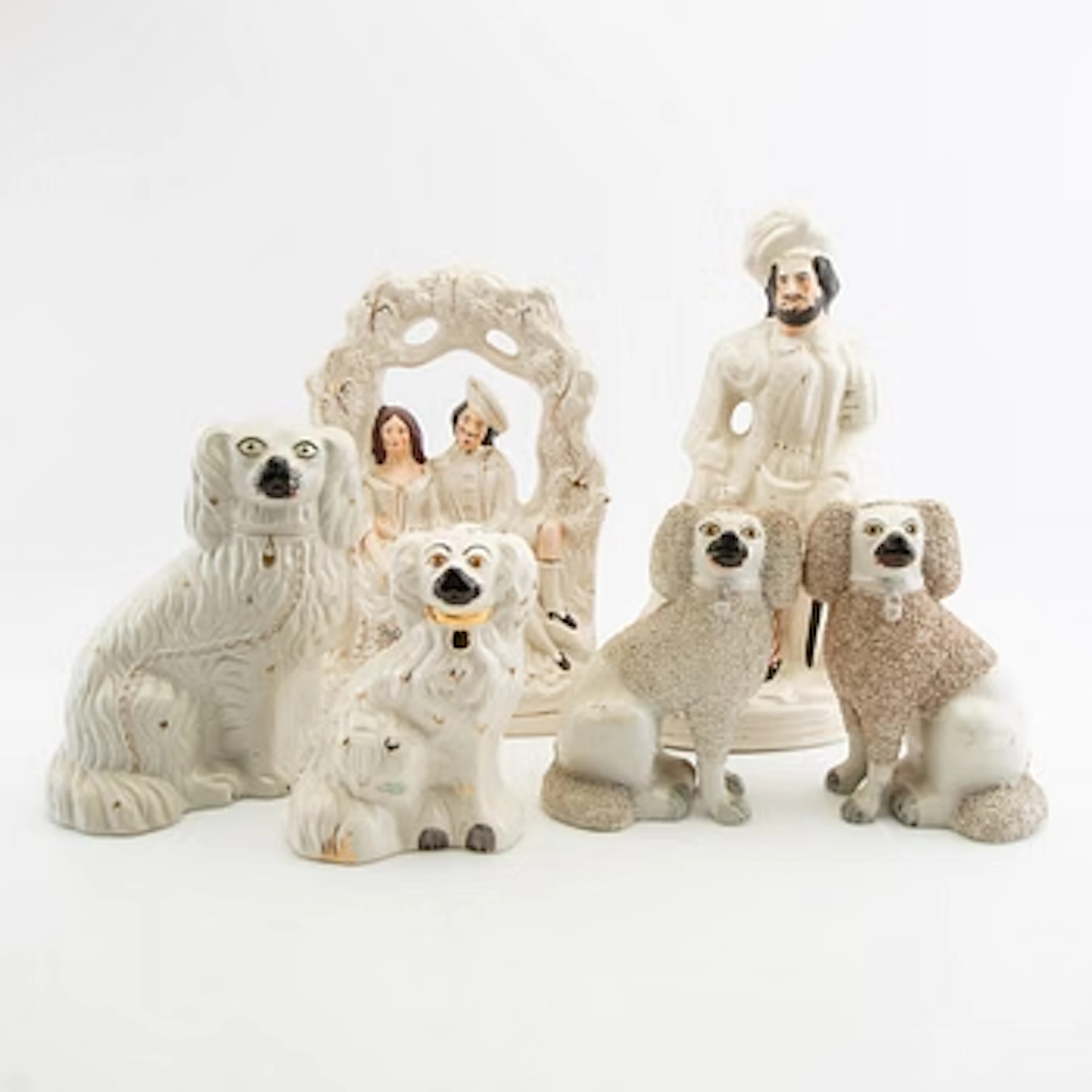 Eight Staffordshire-type figurines, England, early 20th Century.