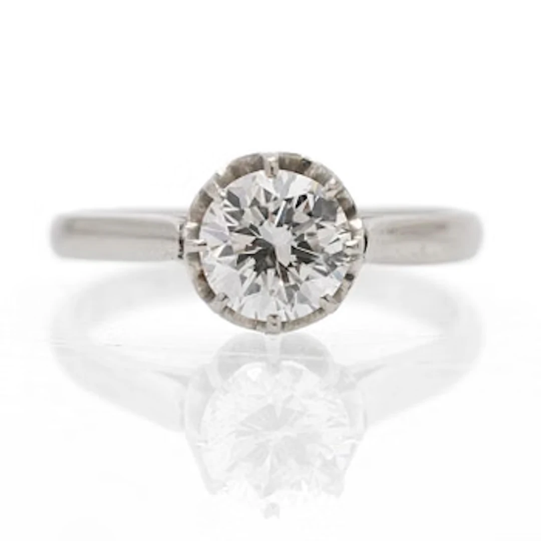 18K white gold solitaire ring with a diamond, France, 20th century.