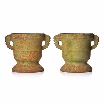 A pair of Swedish cast-iron garden urns, 18th century.