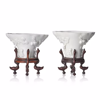 Two blanc de chine rhinoceros libation cups, Qing dynasty, Kangxi (1662-1722).