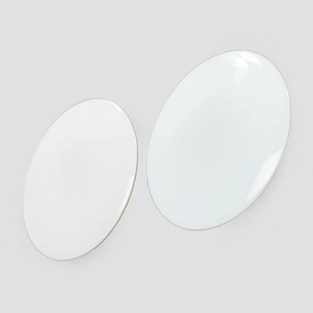 Arne Jacobsen, a pair of 1960's 'AJ-Eklipta' ceiling / wall lamps