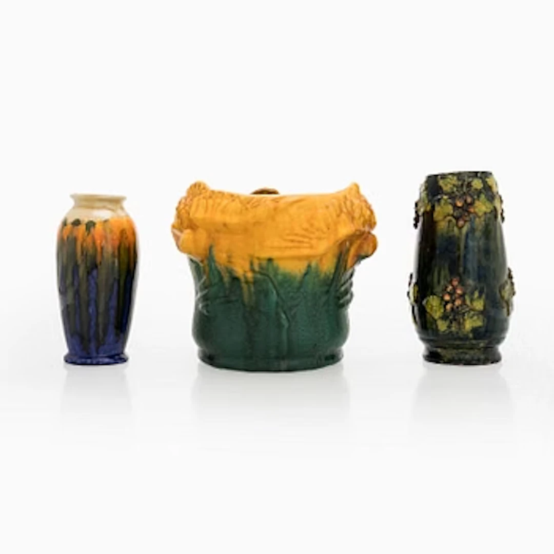 Flower pot for Turun kaakelitehdas, and three vases, early 20th century.