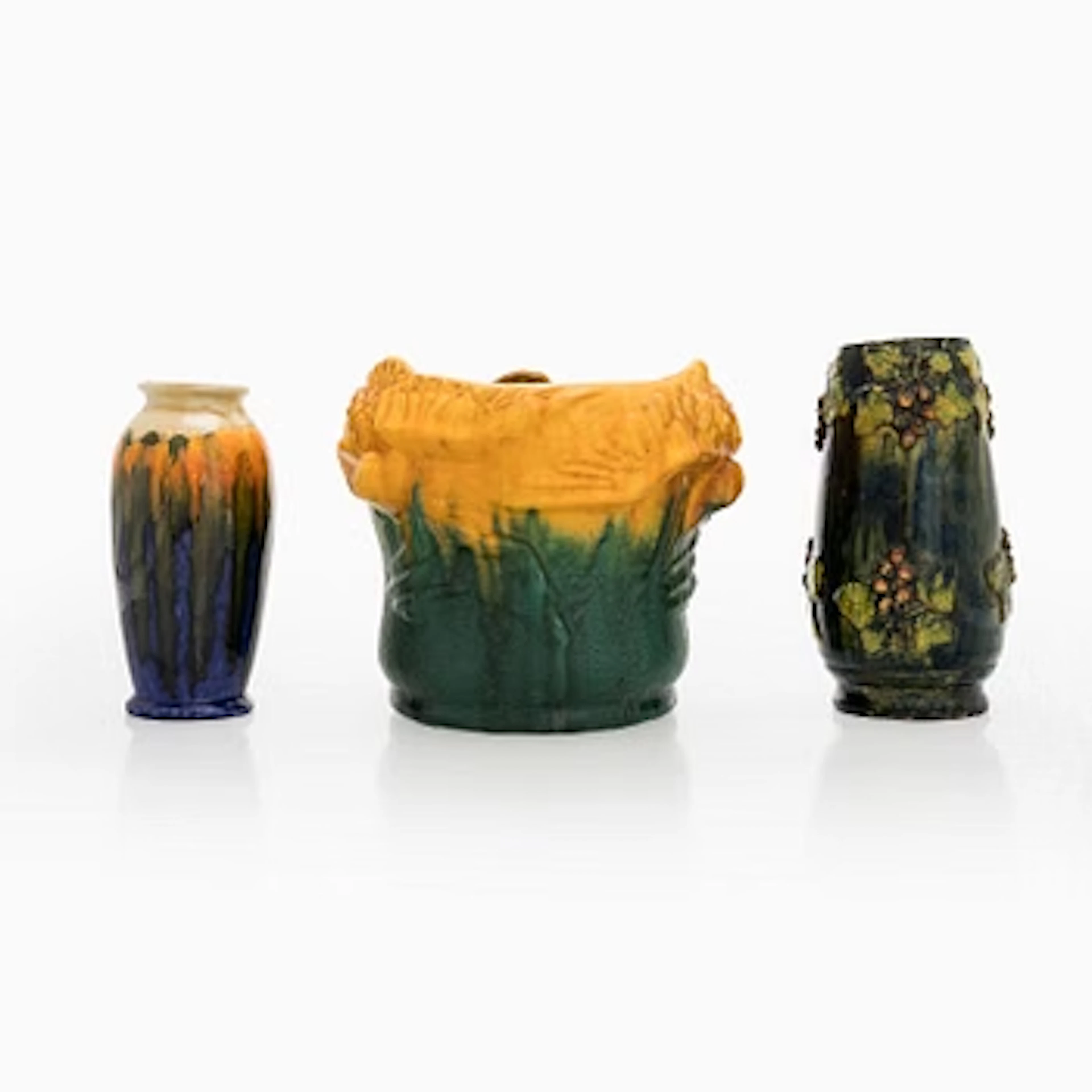 Flower pot for Turun kaakelitehdas, and three vases, early 20th century.