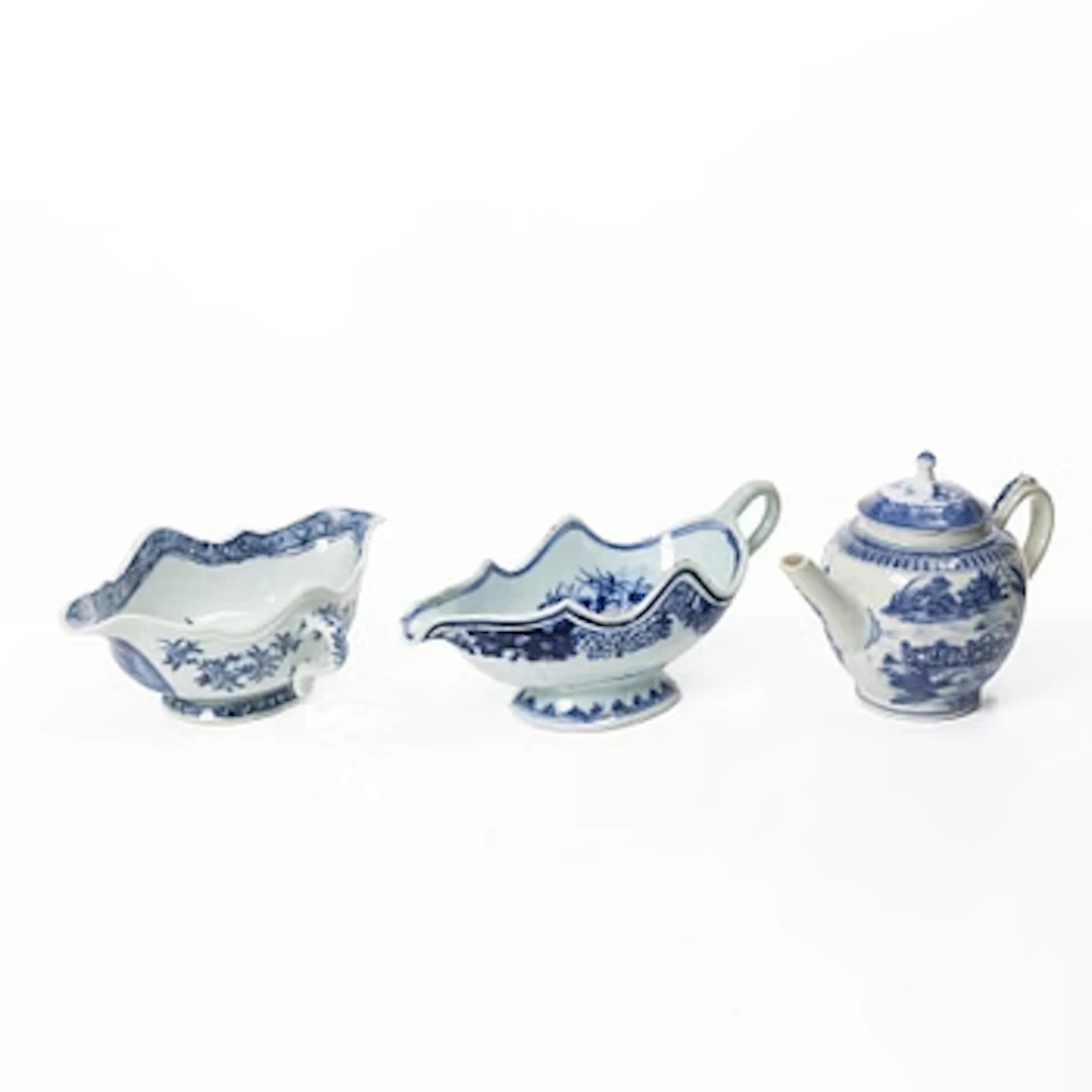 Two Chinese blue and white export porcelain sauceboats and a teapot