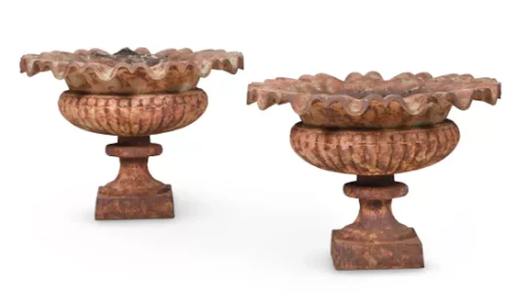 A PAIR OF CAST IRON GARDEN URNS WITH UNDULATING RIMS, FRENCH, EARLY