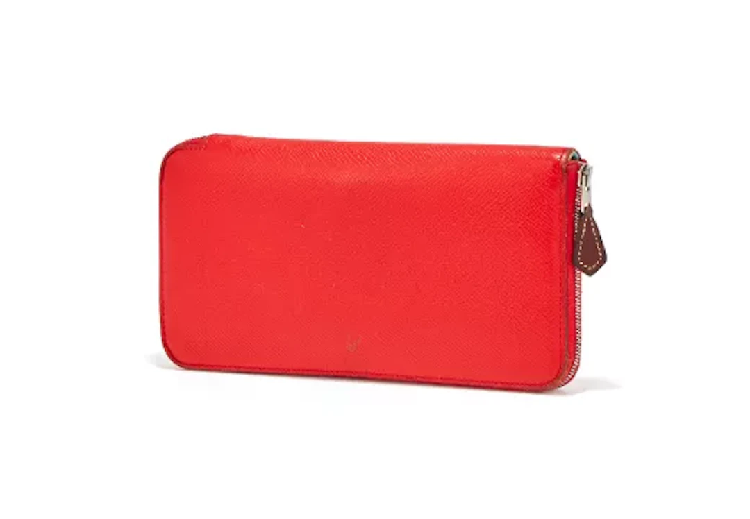 HERMÈS, A RED LEATHER WALLET