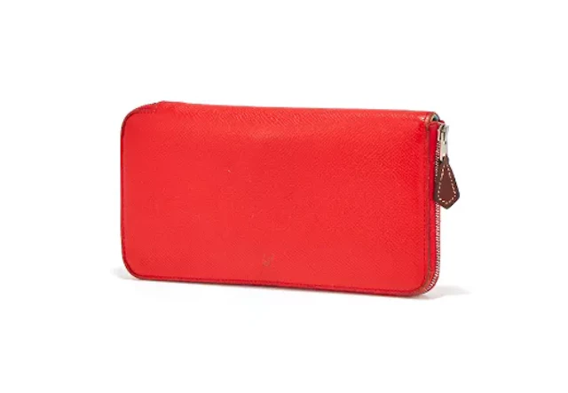 HERMÈS, A RED LEATHER WALLET