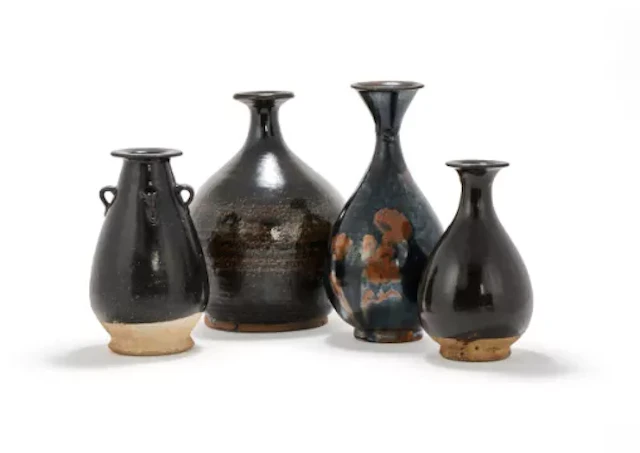 Four Chinese black glazed vases, Yuan dynasty and later