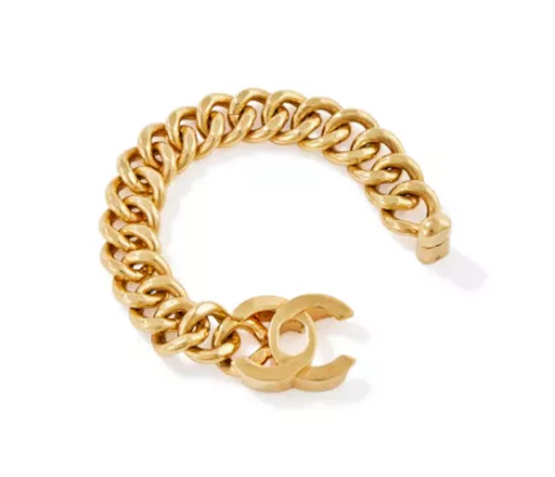 CHANEL, CC TURNLOCK, A GILT BRACELET, CIRCA 1993