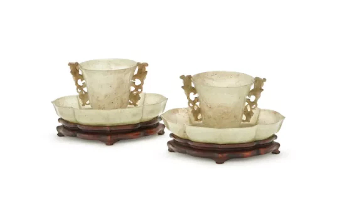 A pair of Chinese celadon semi-transparent Mughal style jade cups