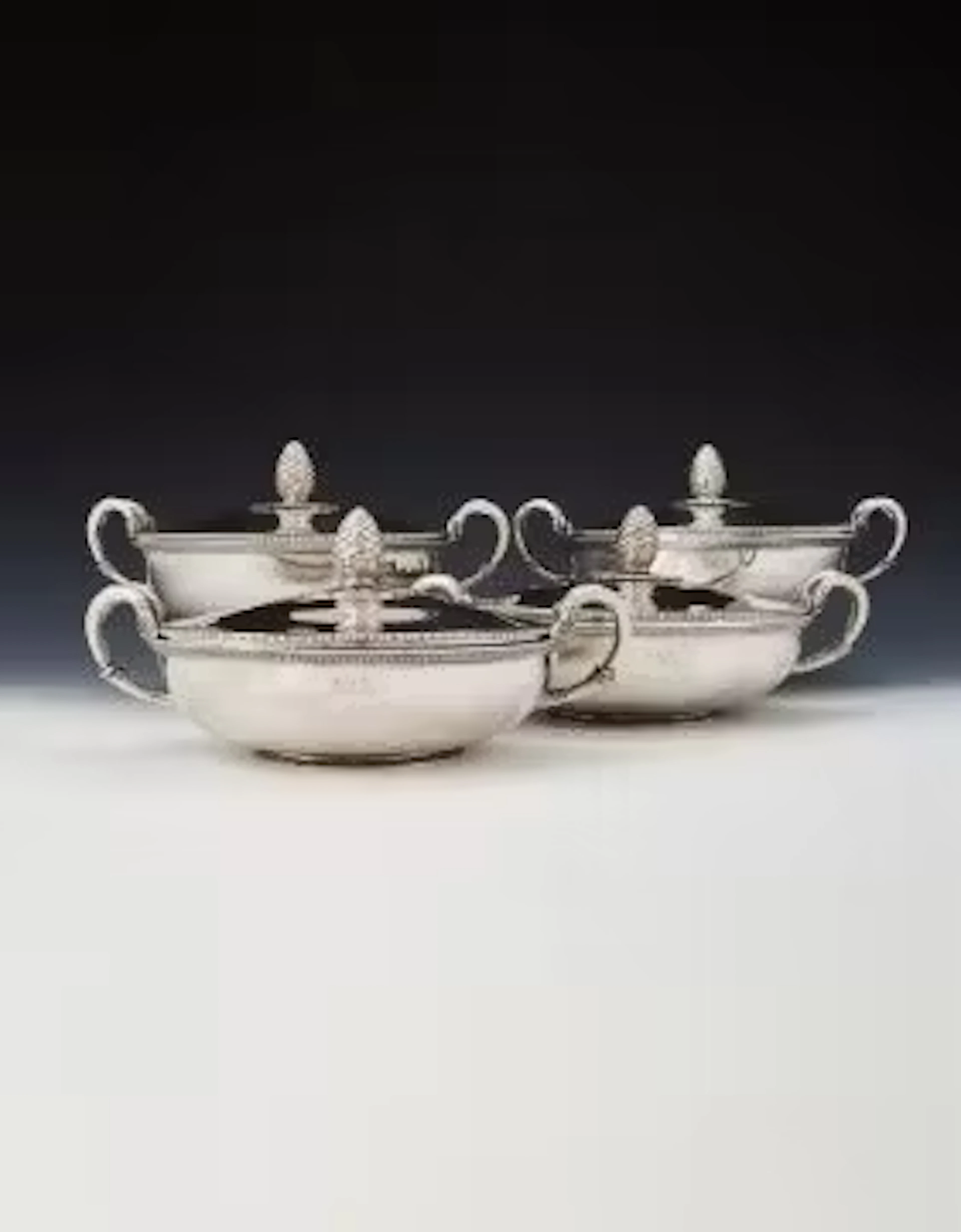 A SET OF FOUR FRENCH EMPIRE SILVER VEGETABLE DISHES