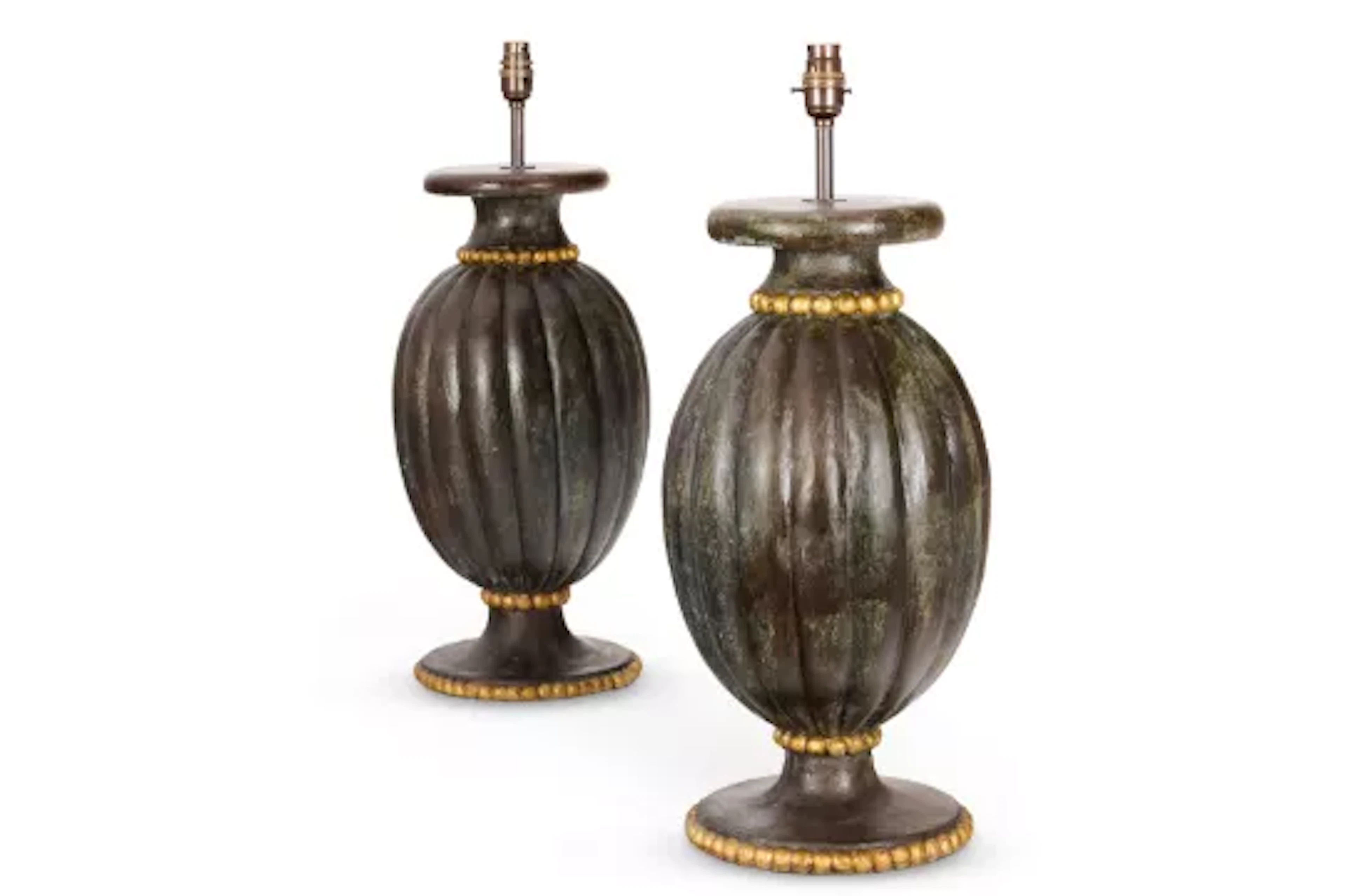 A NEAR PAIR OF CARVED AND PAINTED WOOD OVOID AND GADROONED LAMPS