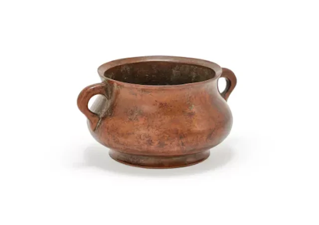 A Chinese bronze twin handled censer