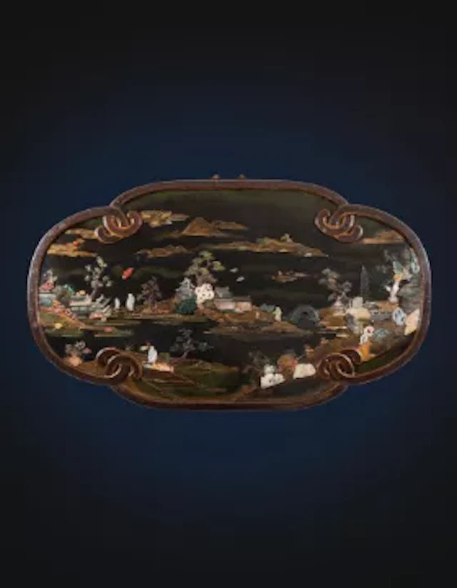 A large Chinese inlaid lacquer wall panel