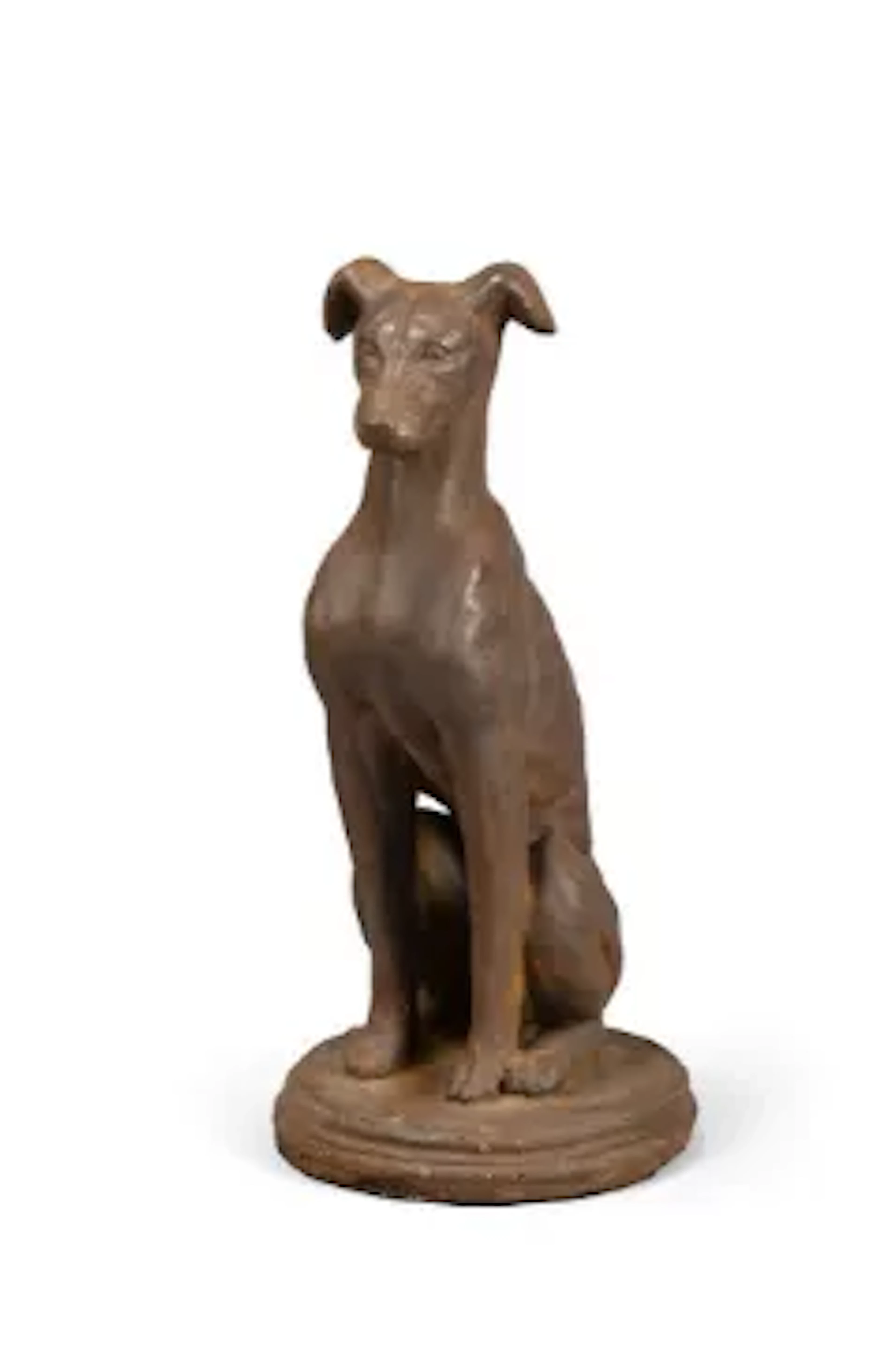 A BRONZED COMPOSITION STONE SEATED WHIPPET DOOR STOP OR DOOR PORTER